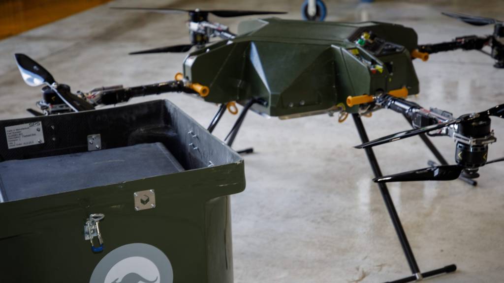 Flying wheelie bins hit the spot for RAAF Hercules precision drone drops